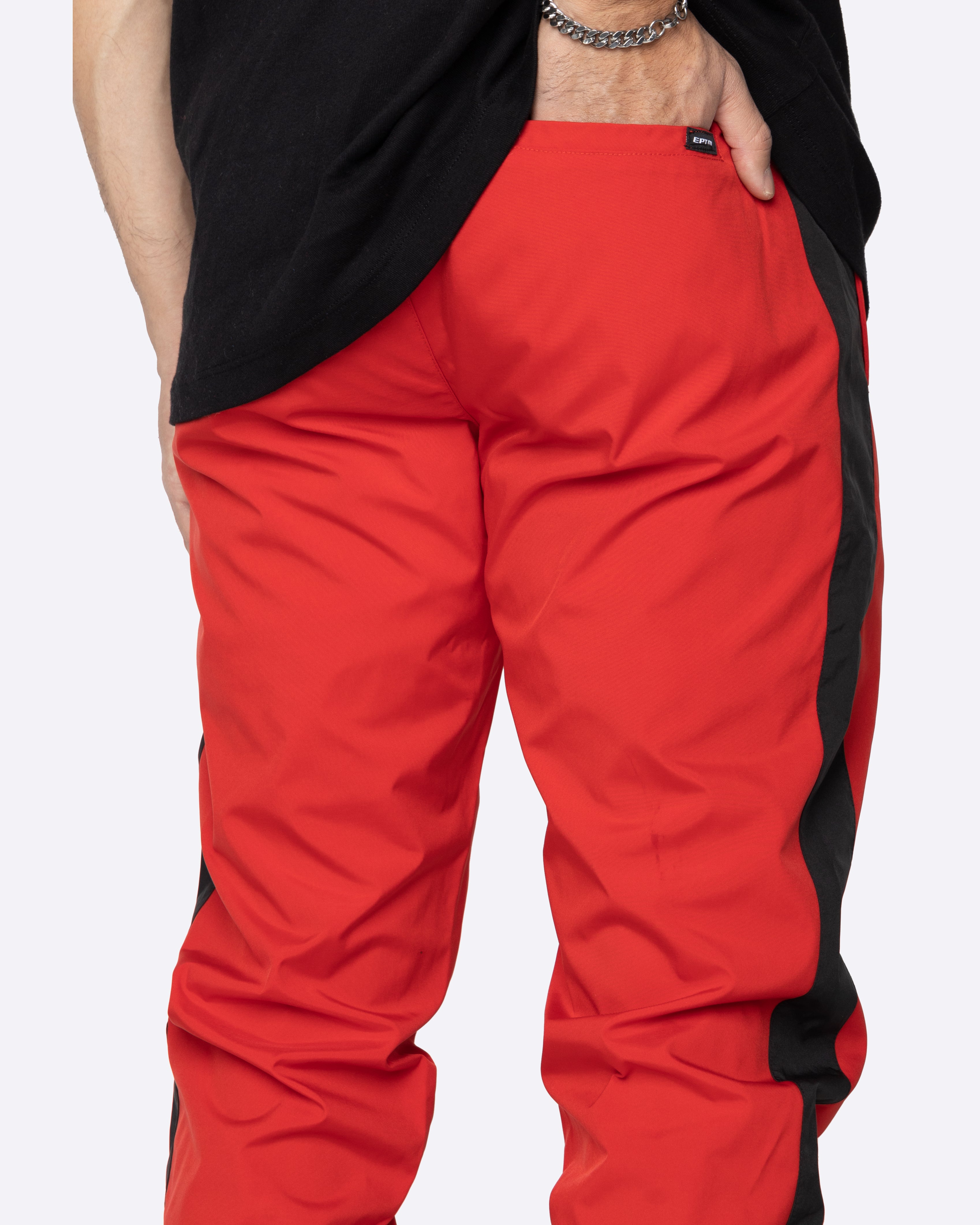 Red nylon track online pants